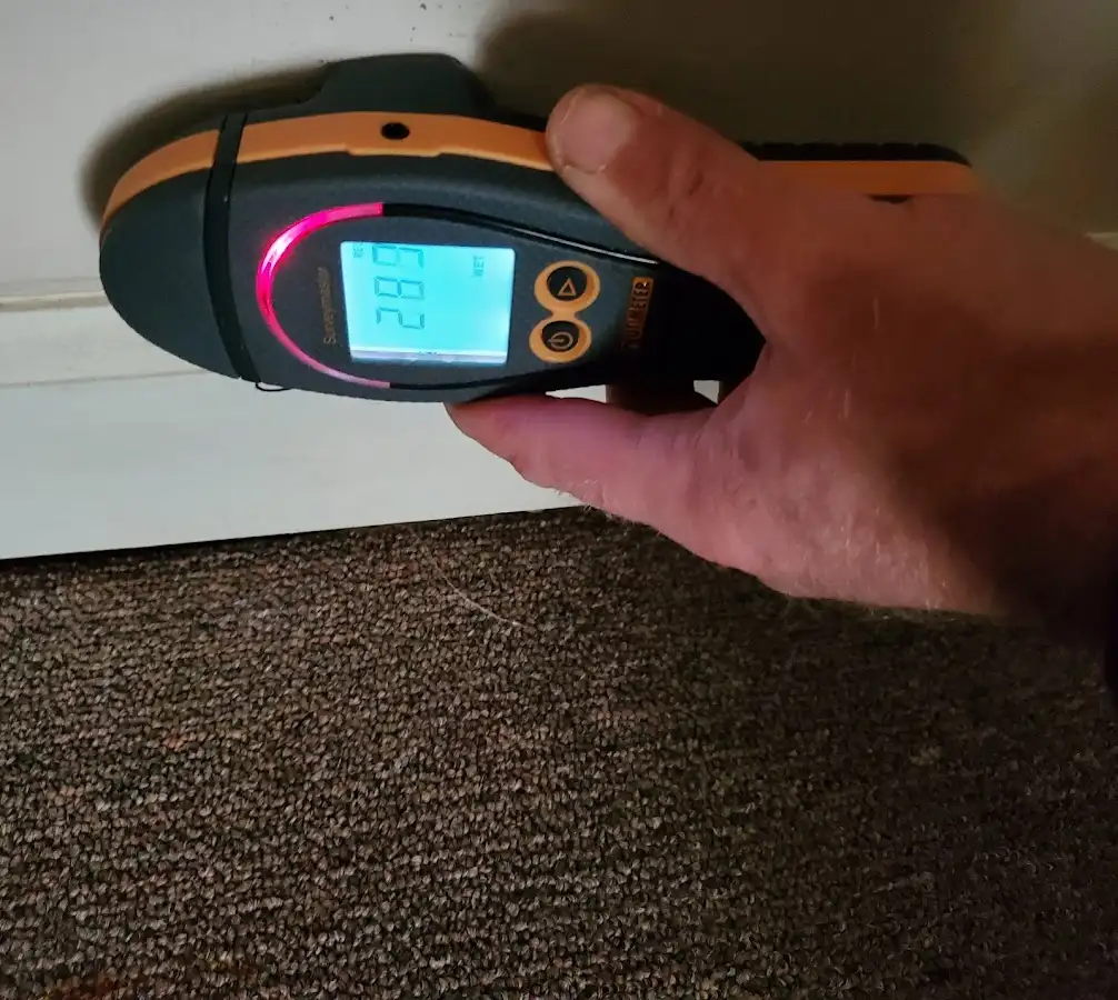 Moisture detection at baseboard during Storm Damage Restoration in Cupertino